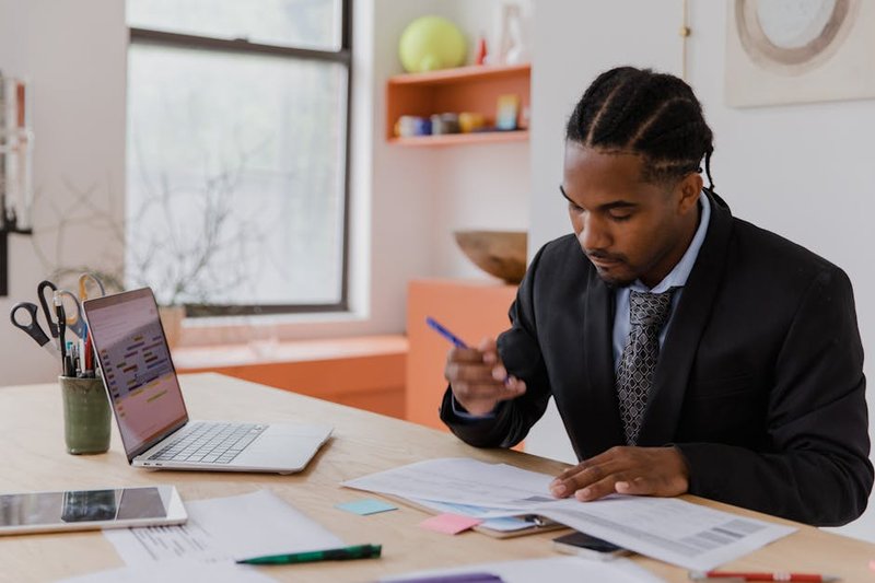 business owner reviewing automation dashboard - ai tools for workflow automation