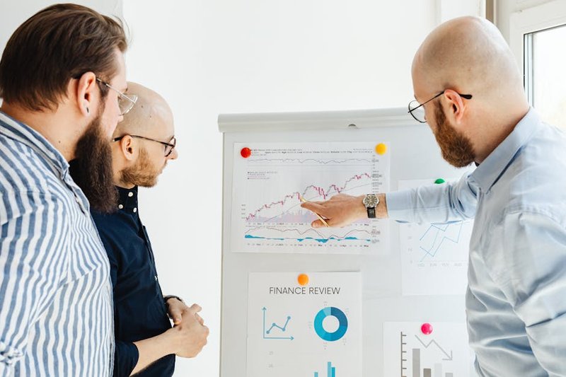 business owner reviewing cost savings chart - workflow automation ai agent